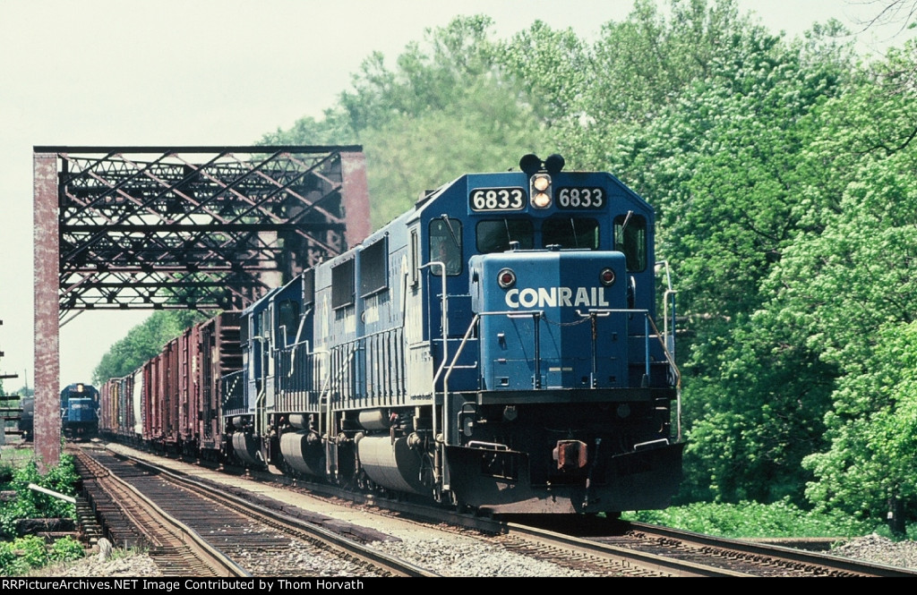 CR 6833 leads a general merchandise freight east over the Raritan River